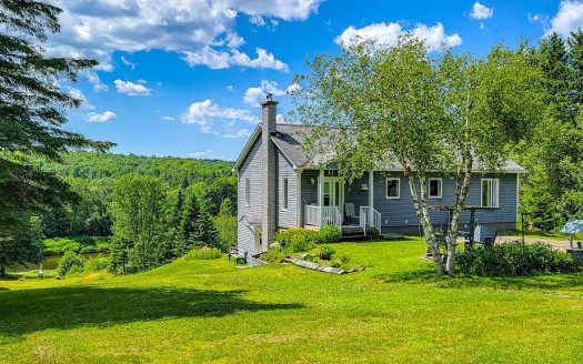 Waterfront home for sale Eastern Townships Flex Immobilier Front elevation